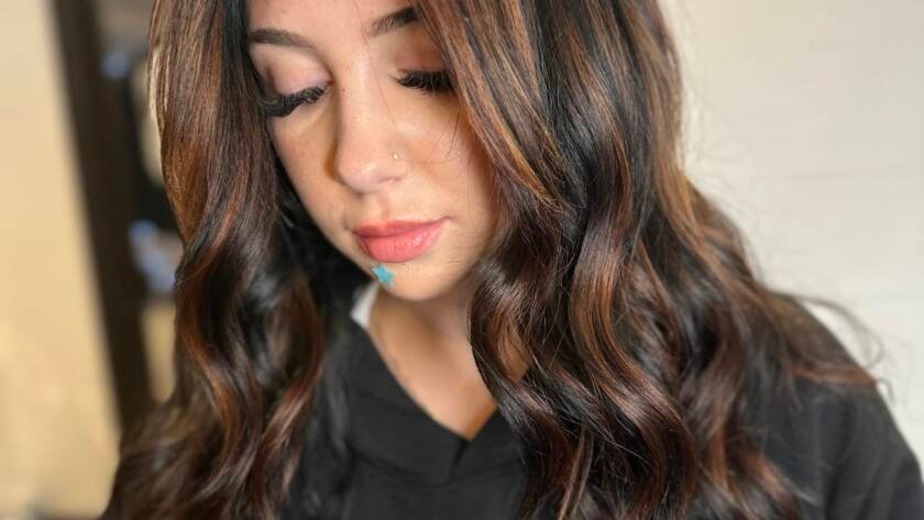 Radiant in the Dark: Black Hair with Captivating Copper Highlights 1 Bold Contrast Black Hair Enhanced by Copper Streaks